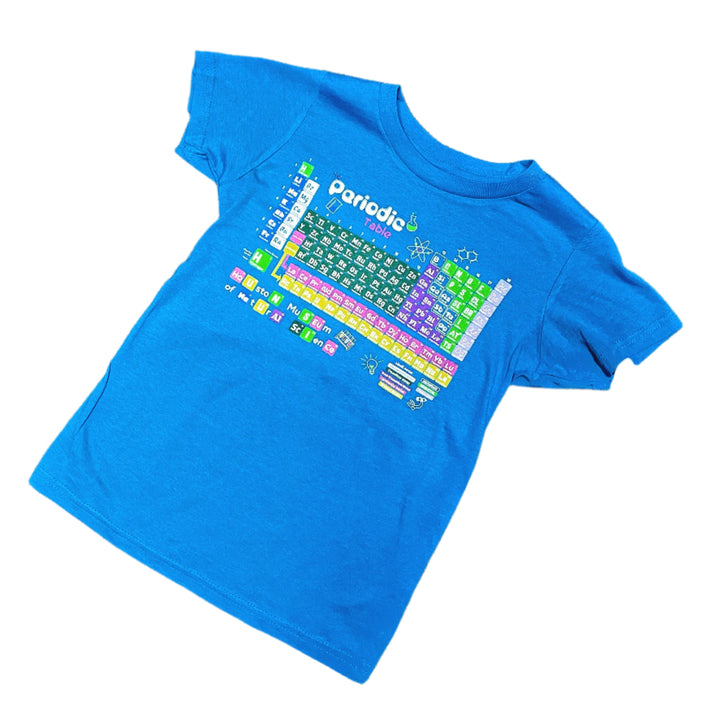 Blue t-shirt with periodic table design on a textured gray surface