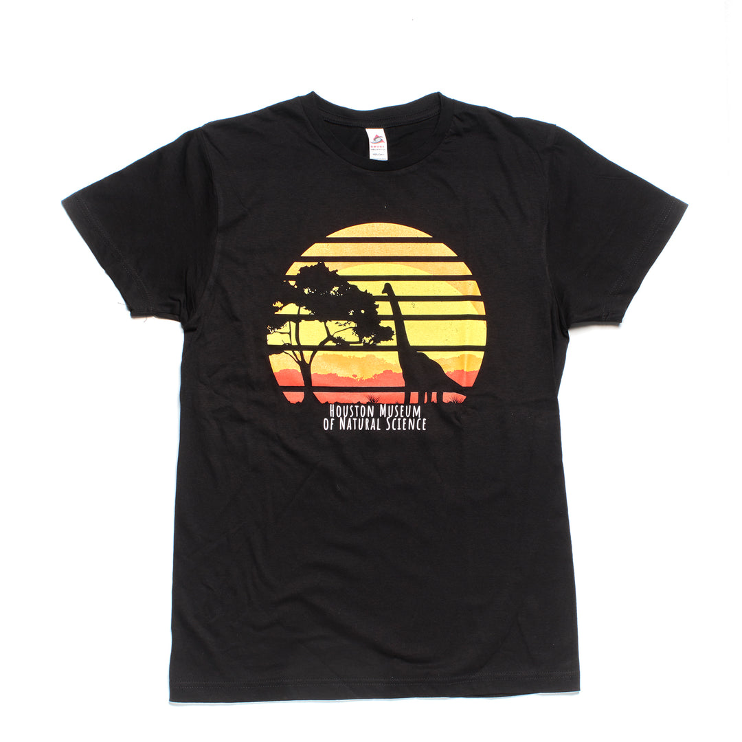 black shirt featuring silhouette of a brontosaurus and tree. the background of the graphic features a stylized gradient of yellow to orange, with the name Houston Museum of Natural Science below.