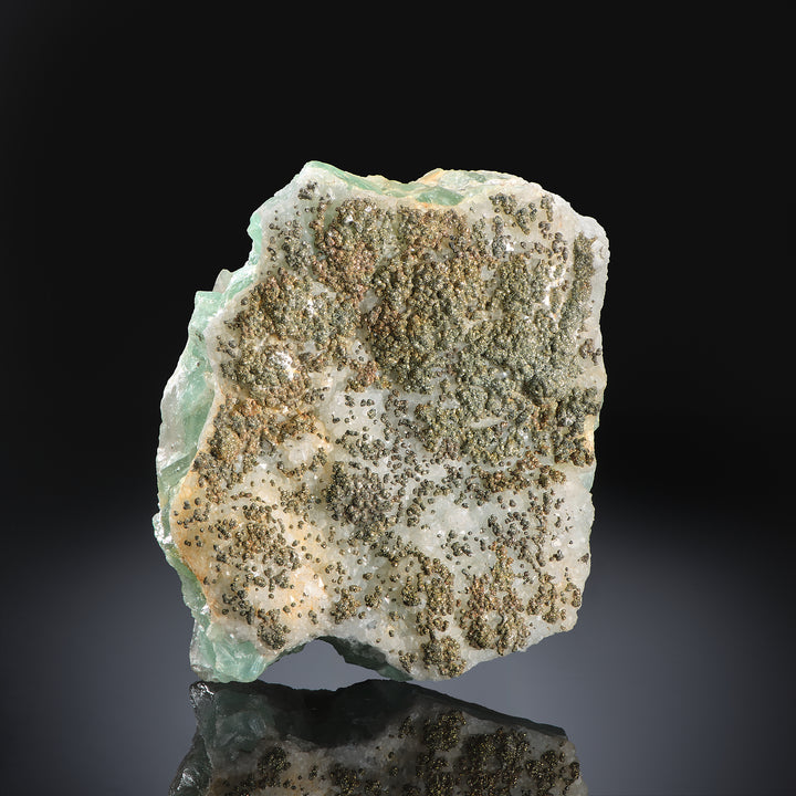 Pyrite on Fluorite