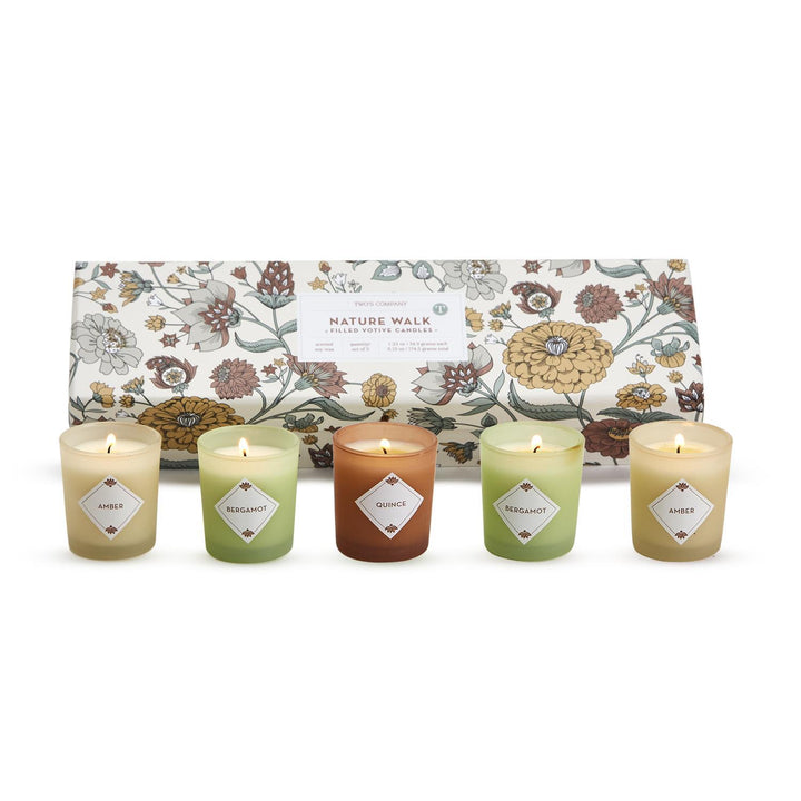 five candle set and gift box featuring two amber scented candles, two bergamot candles, and a single quince candle