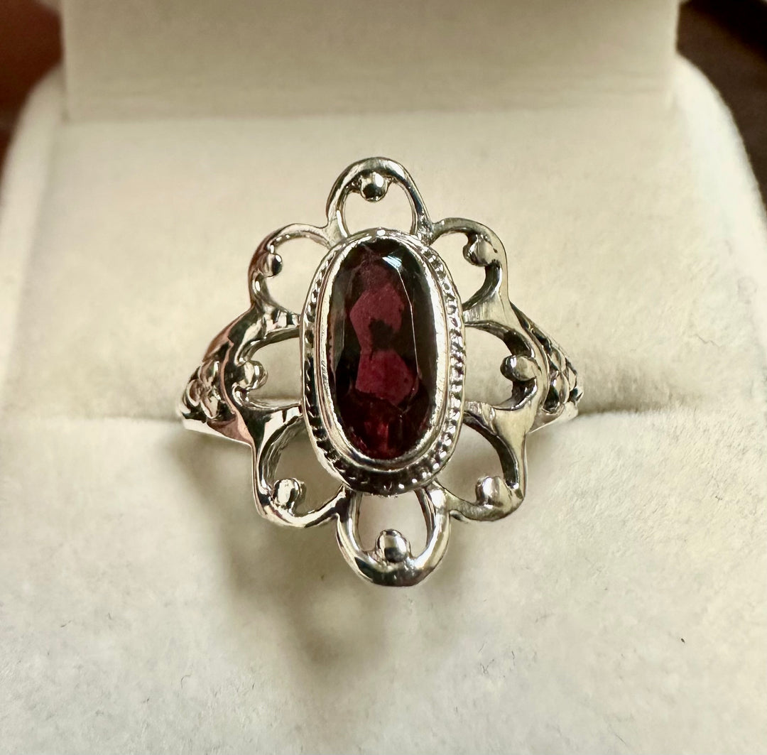 Garnet in Looping Frame Ring