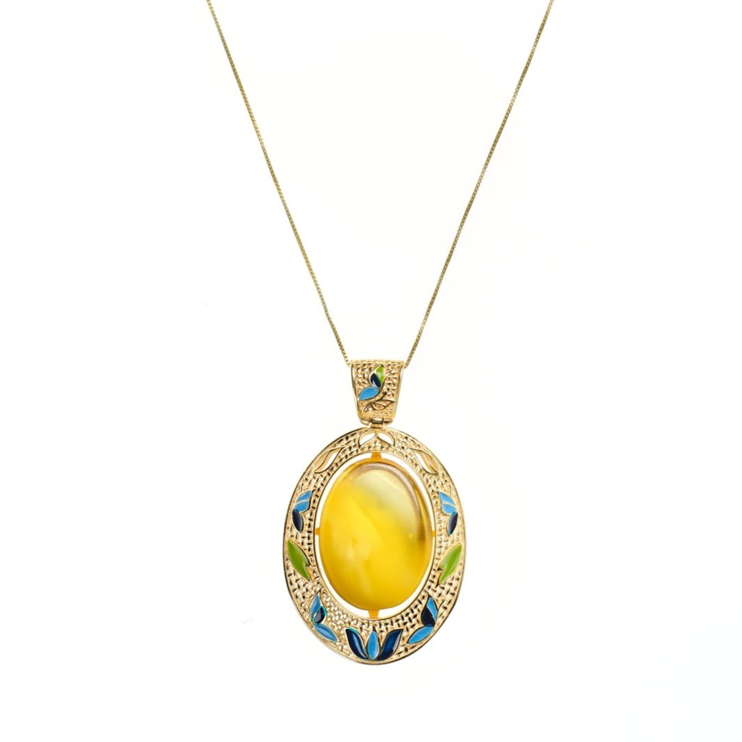 amber pendant with colorful gold edge