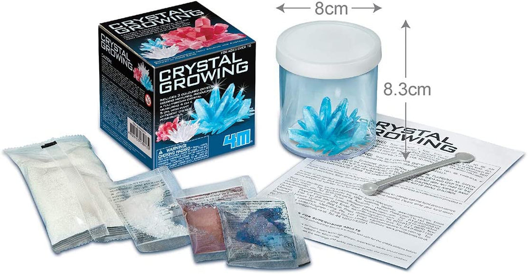 Crystal growing kit with packaging, container, and instructions on a white background