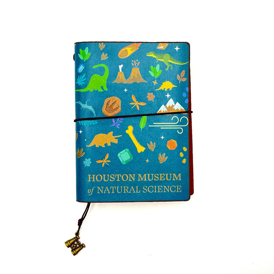 dinosaurs and other paleontology topics decorate the teal blue leatherette cover 