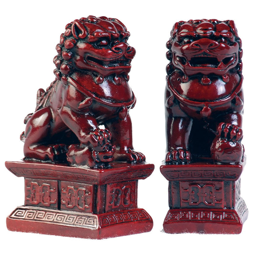 red replica sculptures of fu dogs from Chinese history