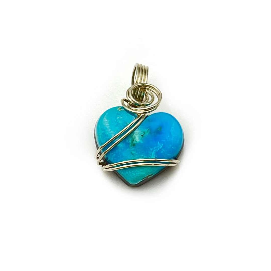 turquoise blue pendant in the shape of a heart