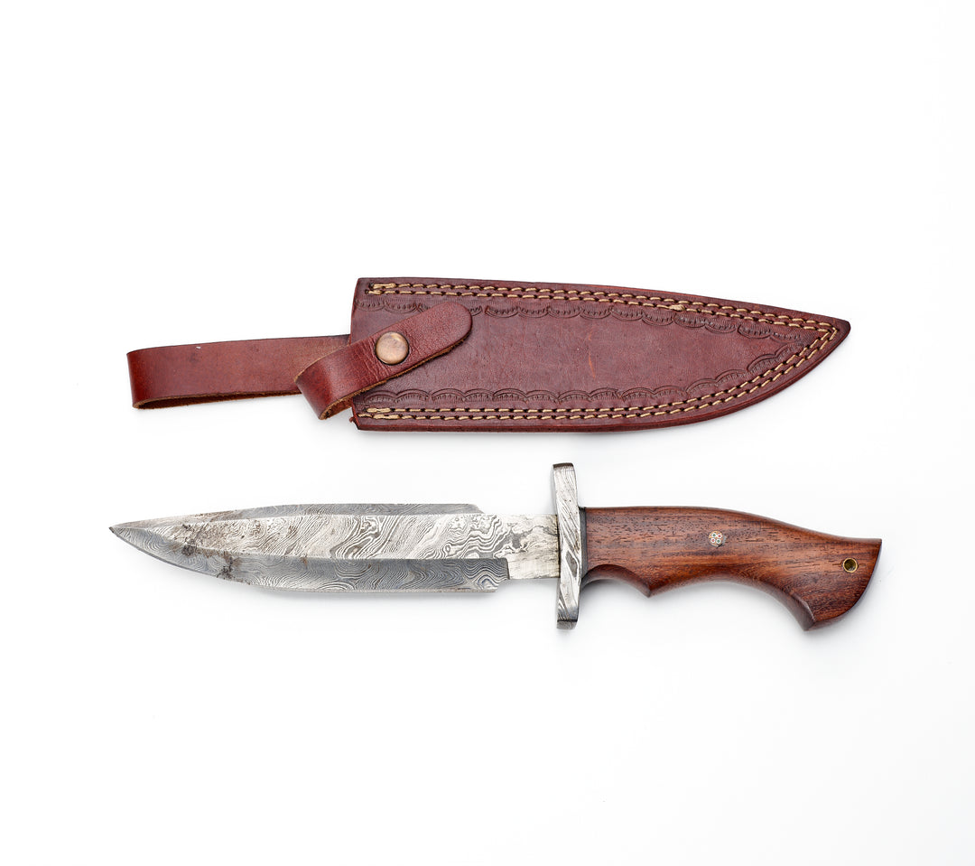 A Damascus Bowie knife with a wooden handle and a leather sheath, displaying the blade and the handle against a white background.