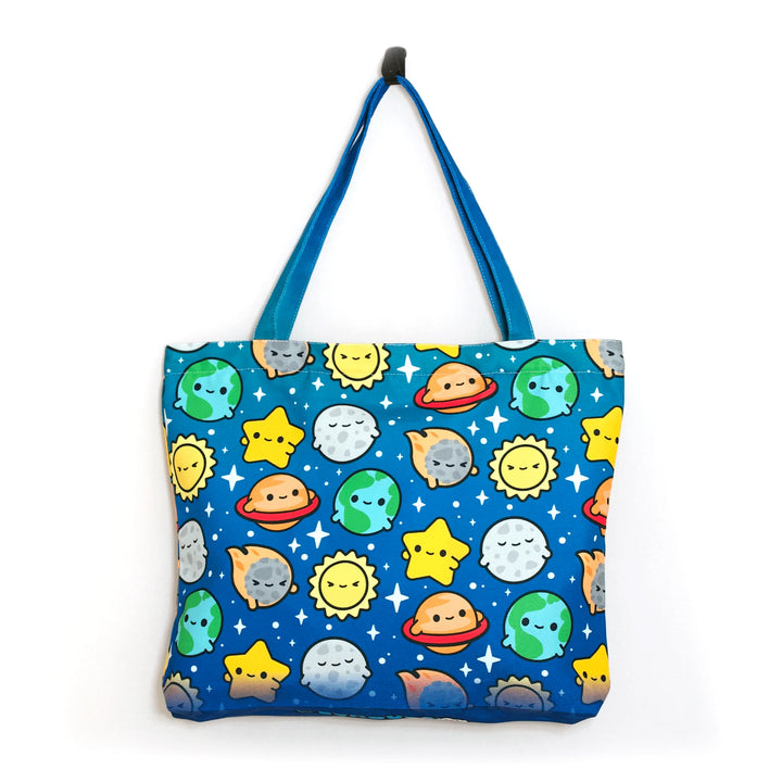 Cartoon planets from the solar system blue tote bag