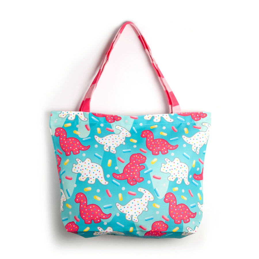 white and hot pink Dinosaur Circus Cookie Tote Bag with Sprinkles and light blue background