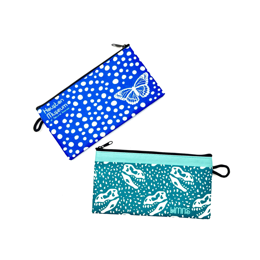 two versions of the pencil bags shown, one teal with dinosaur decals and the other sky blue with butterfly decals