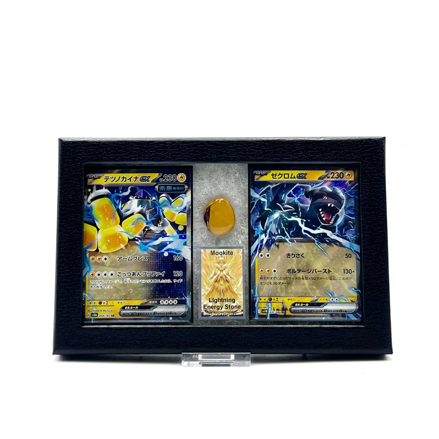 Pokémon trading cards in a display case with a white background