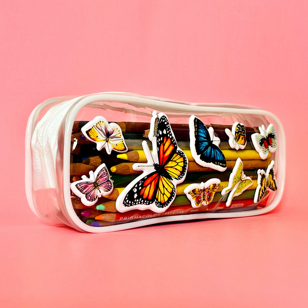 Pencil case with butterfly designs on a pink background