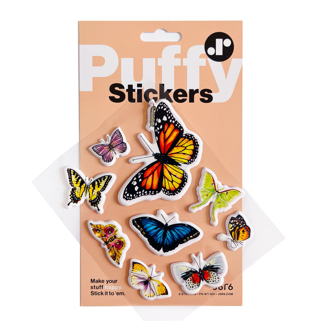 Packaged puffy stickers with butterflies on a beige background