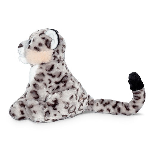 a side view of the black and white snow leopard plush toy with its tail stretched out on a white background