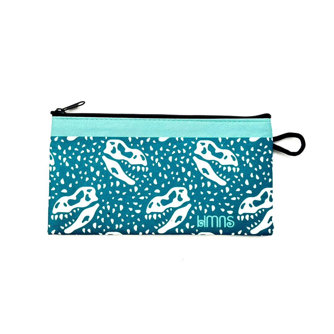 teal pencil case with zipper, white dinosaur skull and polka dot decals