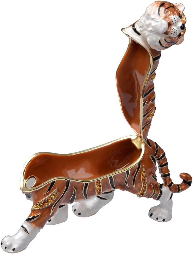 Decorative tiger figurine with jewelry on a white background