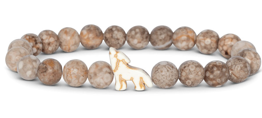 beaded bracelet with howling wolf bead on white background
