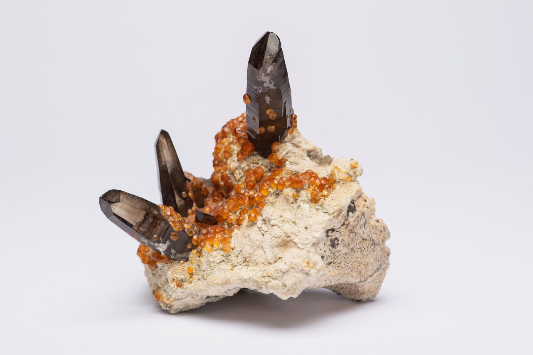 Hessonite Garnet on Smoky Quartz