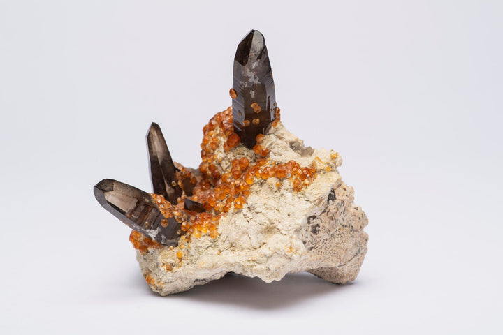 Hessonite Garnet on Smoky Quartz